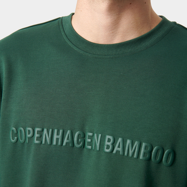 Grönt joggingset i bambu med logotyp