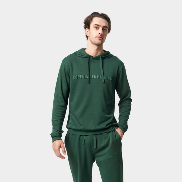 Grön huvtröja i bambu med logotyp